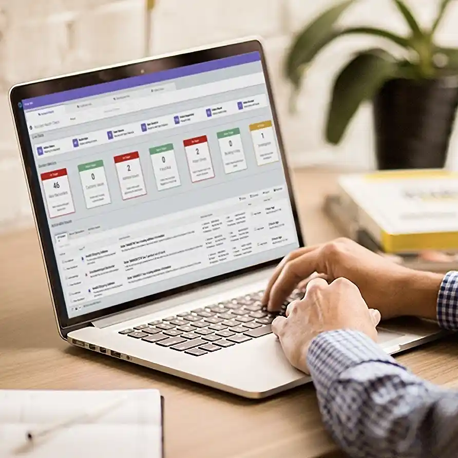 Man checking orders on Blade Pro in an office Man checking orders on Blade Pro in an office
