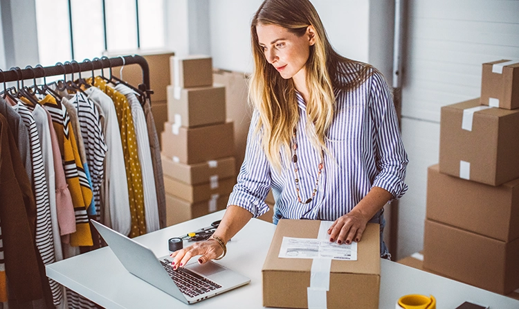 Small business owner packing orders in small office 1 |