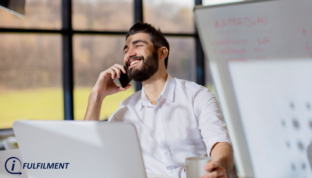 From Provider Selection to Efficiency_ I-Fulfilment’s Solution - Man Smiling while talking to a phone talking an I-Fulfilment partner